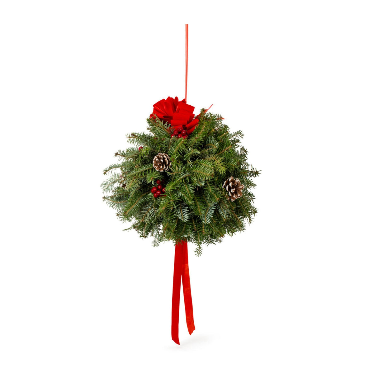 Beautiful evergreen arrangement of fresh cut Christmas clippings displayed with a red bow on top, small pinecones showing, and red ribbon tails below. This hangs from a string intended to resemble mistletoe. 